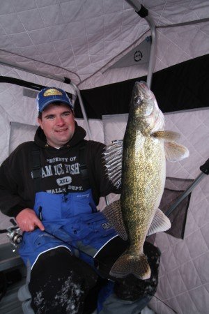 Walleye caught while ice fishing structure choke point.