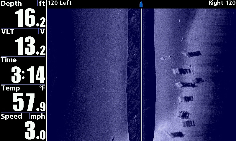 (Photo courtesy of Humminbird)– “Preseason boat surveillance with Side Imaging reveals some remarkable hide-outs, such as this string of sunken cribs and an old boat.”